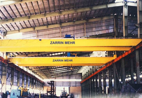 Overhead Crane Performing Heavy-Duty Lifting Tasks in Industrial Facility