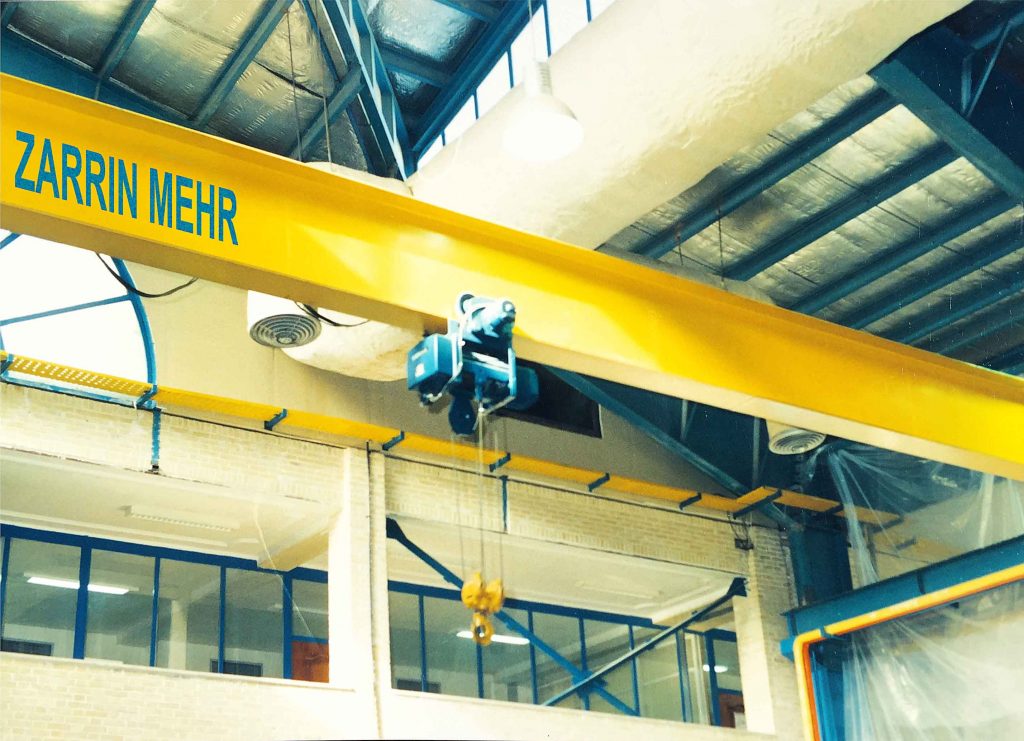 Zarrin Mehr Single Girder Overhead Crane demonstrating heavy-duty lifting and material handling capabilities in an industrial setting, similar to gantry crane and electric hoist solutions.