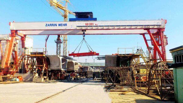 60 Tons Double Girder Gantry Crane in industrial operation, showcasing ZARRIN MEHR's expertise in heavy-duty material handling solutions.